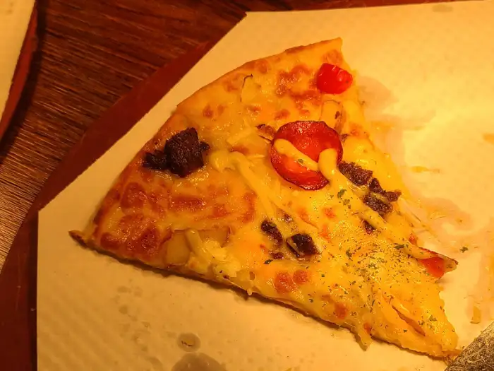 맛있는 피자 한 조각